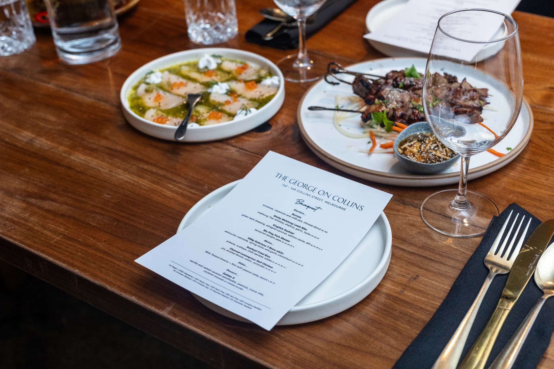 The dinner menu on the table at the September 2026 Melbourne Leaders Dinner